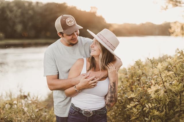 Claire and Trevor during their engagement photoshoot, holding each other in a loving embrace.