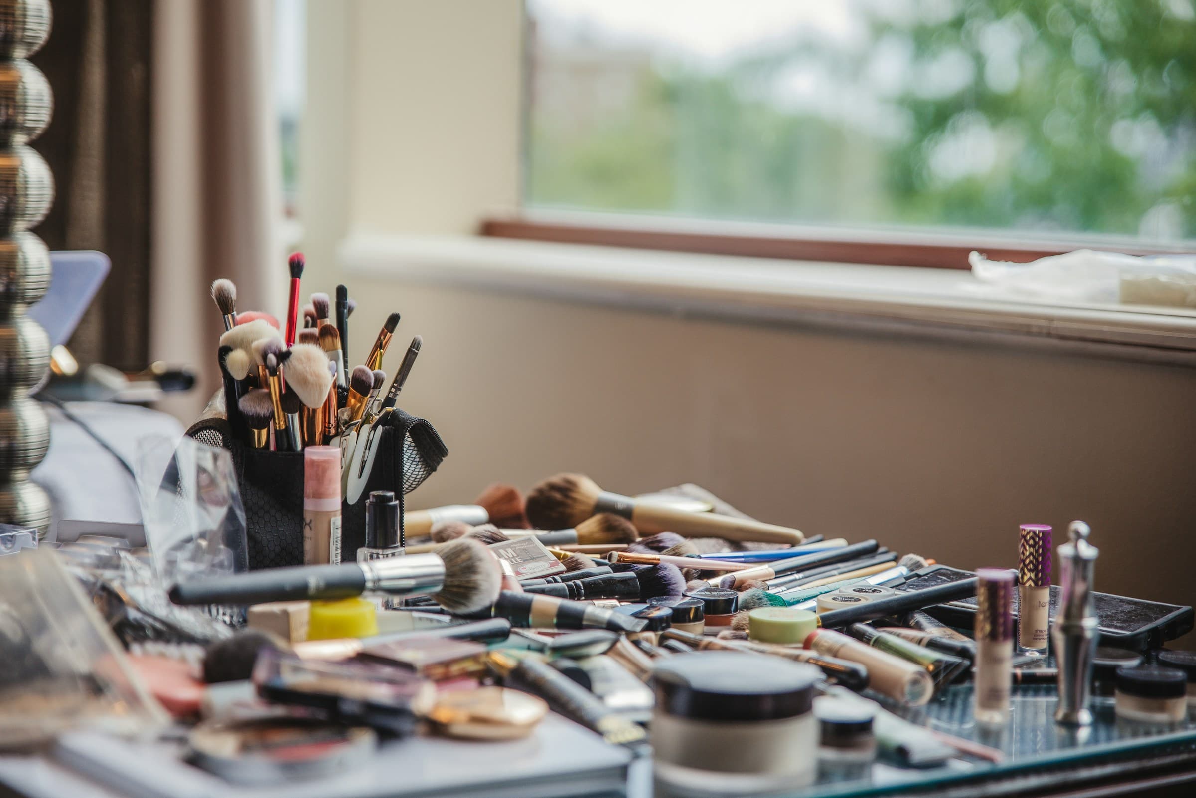 Makeup artist table with supplies laid out